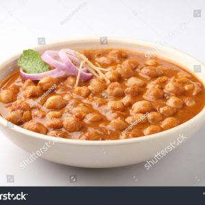 A bowl of food with some type of sauce.