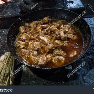 A pan of food that is cooking in the oven.