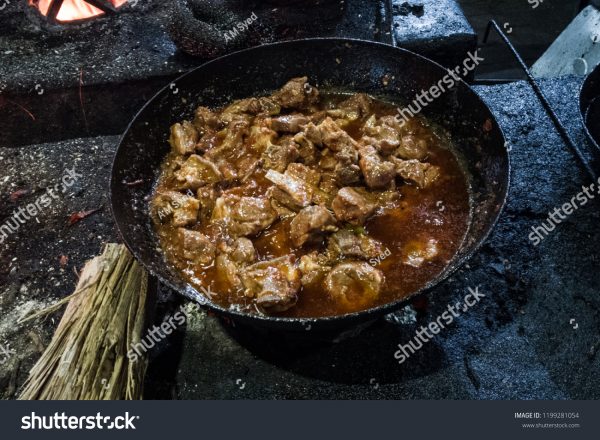 A pan of food that is cooking in the oven.